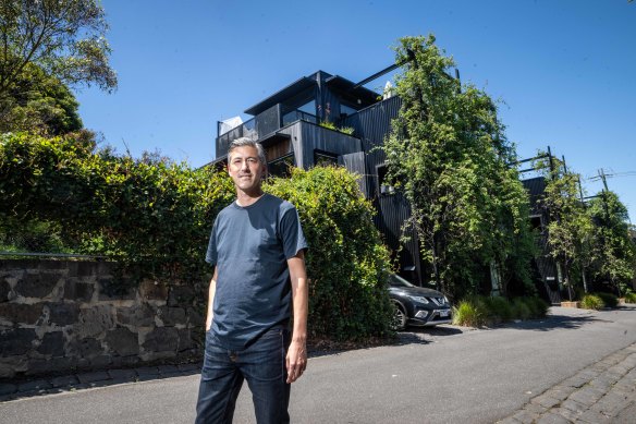 Tim Riley outside the home he built through a co-operative.