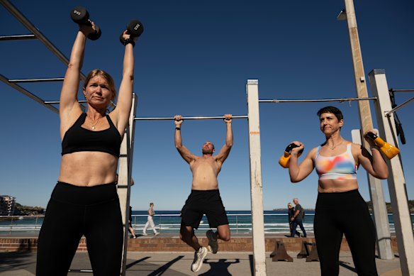 Virginia Venn, Joey Pamment and Louise Brandon pictured at the outdoor gym at Bondi Beach.