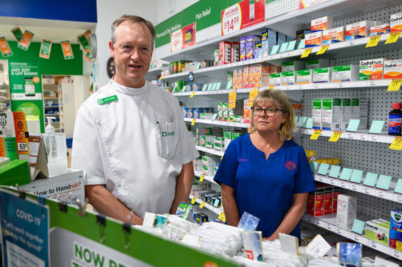 Pharmacist Brett Phillips and nurse Cindy Williams in the Rochester pharmacy that became a de facto field hospital. 