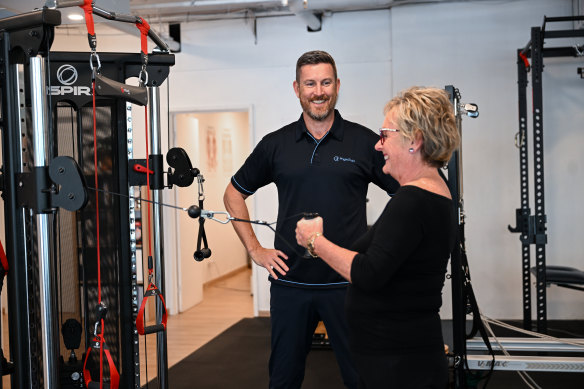 Sports physiotherapist Andrew Hoare with client Jill Dore, who says that strength training helps her to stay active and keep up with her grandchildren.