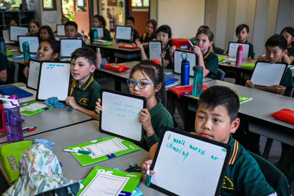 Students at Brandon Park Primary School in Wheelers Hill practise their spelling.