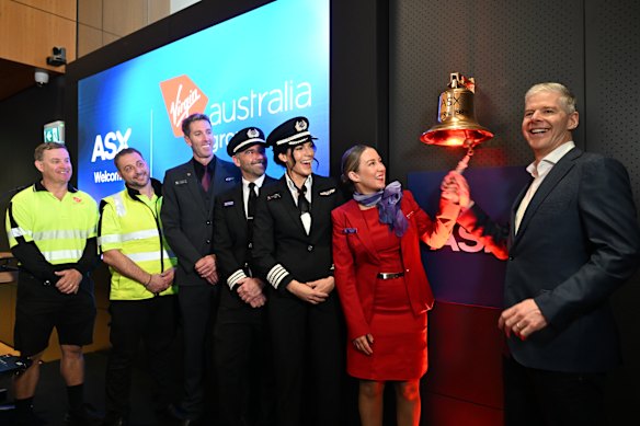 CEO Dave Emerson and Virgin Australia employees at the ASX.