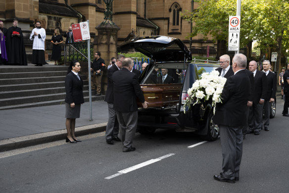 Cardinal George Pell’s coffin arrives at St Mary’s Cathedral.
