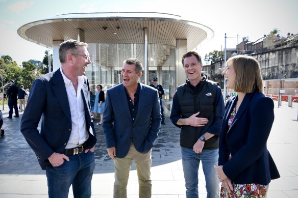 From left: Former Coalition premiers Dominic Perrottet and Mike Baird, with Premier Chris Minns and Transport Minister Jo Haylen at Barangaroo metro station on Saturday. 