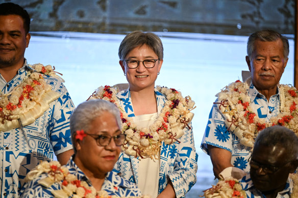 Foreign Affairs Minister Penny Wong, pictured with Pacific leaders, will launch a fund to promote international LGBTQ rights. 