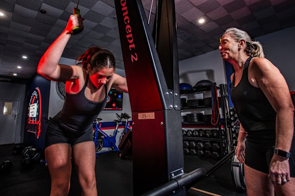 Taya and Janine, pictured at their gym in Dee Why, have a strategy for this year’s race and have been practising extra wall balls after getting 35 “no reps” last year.