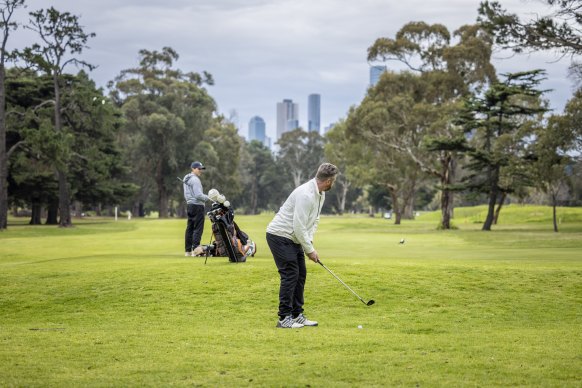 Golfers return to Albert Park Golf Club last week. David McCartney and Dene Heath are pictured on course.