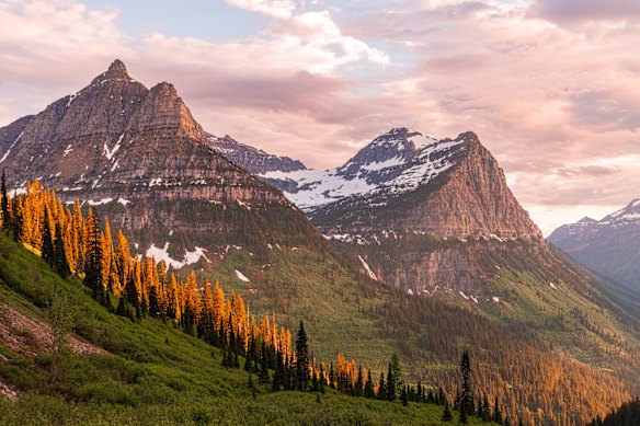 Hulking Mount Oberlin and Mount Cannon loom over Glacier National Park.
