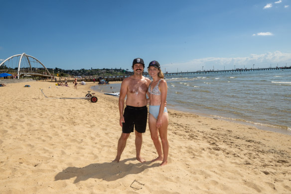 Langwarrin residents Daniel and Lisa Korsak, pictured on Frankston beach, believe the towers would bring life to the CBD.
