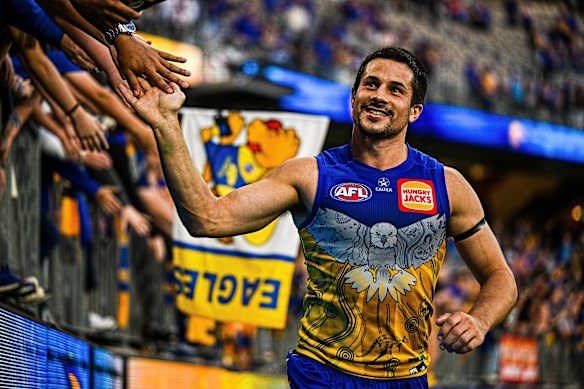 West Coast’s Liam Duggan basks in the adoration of Eagles fans after the club’s first win of the year.