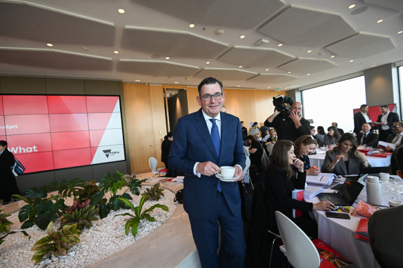 With a cup of tea in hand, Andrews mingled with journalists during the budget lock-up with confidence.