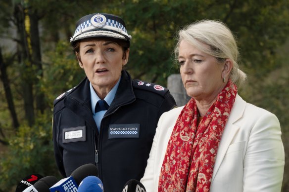 Karen Webb (left, pictured with Police Minister Yasmin Catley) speaks near the crash site on Monday.