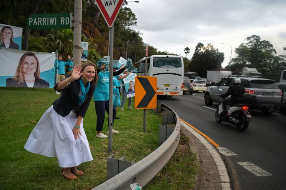 Independent candidate for Manly  Joeline Hackman greets commuters on Spit Rd.