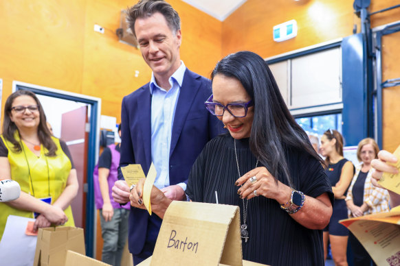 Indigenous Australians Minister Linda Burney casts her Yes vote alongside NSW Premier Chris Minns in Kogarah on Saturday.