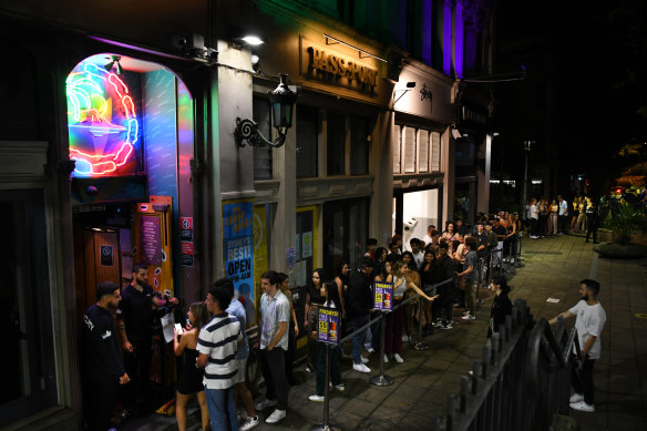 Queues outside the Cliff Dive nightclub at Oxford Square on a Saturday night.