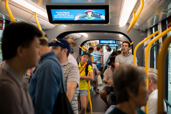 Cricket commuters ride the new Sydney CBD light rail in January.