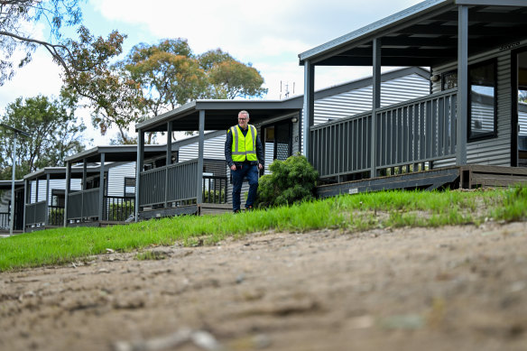 Discovery Parks’ Matt Lang outside cabins that were flooded in Nagambie. 