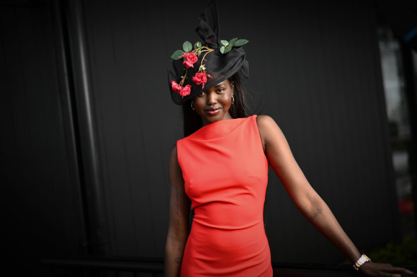 Engaged, and engaging ... Adut Akech Bior at the Melbourne Cup.