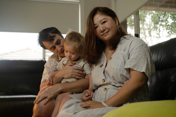 Jenny Jia, Matthew Perram and their child Zachary are hoping to visit China to see family next year.