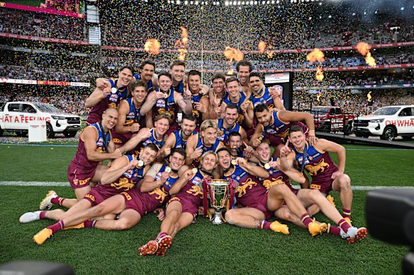 The Brisbane Lions lap up their premiership win last year.