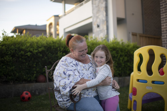 Lynley Andrews, the creator of The Cool Mums of Ryde District Facebook group, at home with her six-year-old daughter Emily.