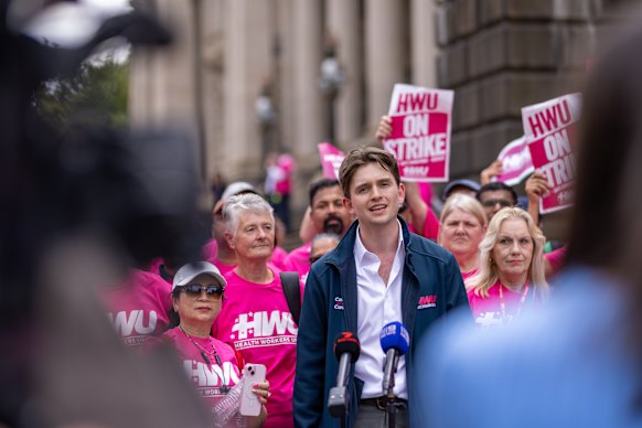 Health Workers Union lead organiser Jake McGuinness at a rally last year.