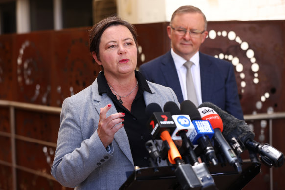 Madeleine King, Labor spokeswoman for trade and resources, addresses the media as Opposition Leader Anthony Albanese looks on.