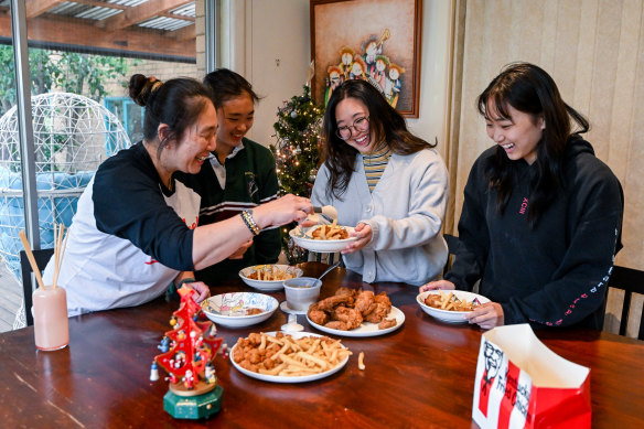 Yumiko Hong, with her daughters, Himiko Hong, Midori Hong and Ranko Hong, will be eating KFC this Christmas.