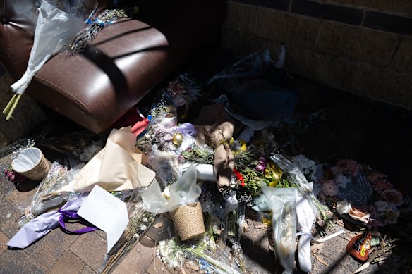 Tributes left on George Street, Hornsby, where Samanvitha Dhareshwar who was eight months pregnant was struck and killed by a car. 