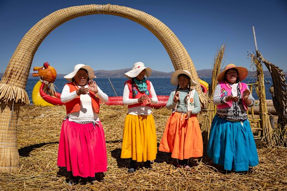 Uros people on a floating island made of totora reeds.