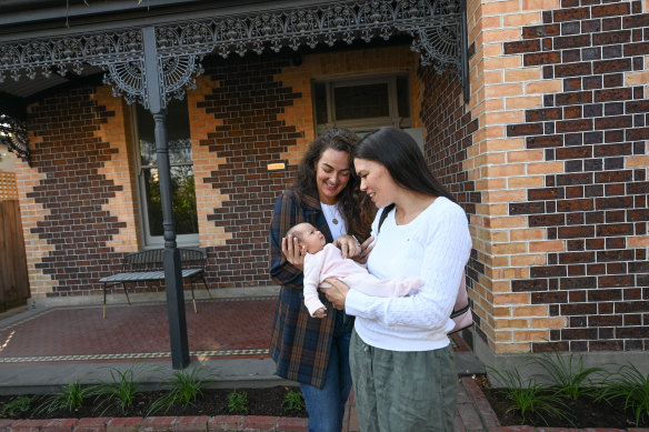Larissa Leone, left, founder of Homb, a recovery and support space for new mothers and parents, with Nikki Walton and 6-week-old daughter Ava.