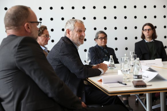 Salvador Rueda speaks to more than a dozen planning and design experts at RMIT University on Tuesday.