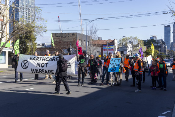 Protesters in Montague Street, South Melbourne on Sunday.