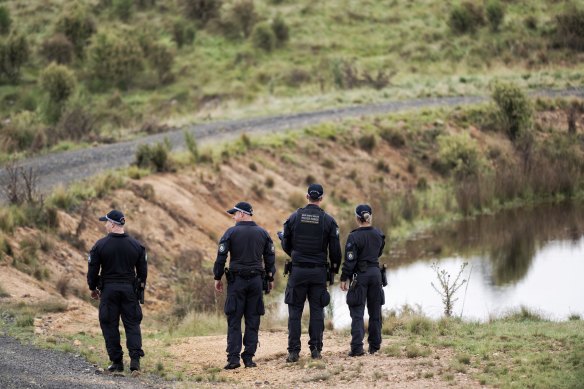 Police conduct a line search in Bungonia the day before Lamarre-Condon allegedly revealed the location of the bodies. 