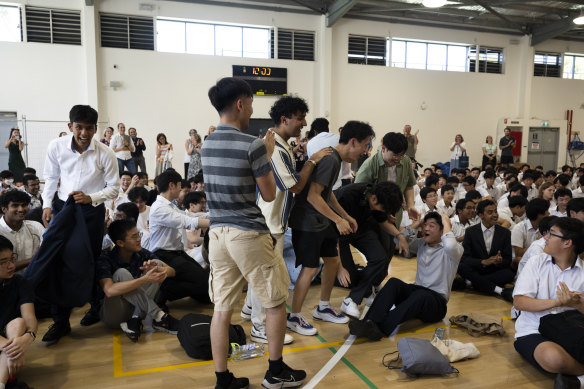 North Sydney Boys HSC students celebrate after annoucement of their school ranking first in the state. 