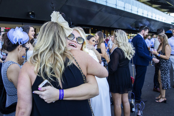 Hugs back on track ... Racegoers at Randwick last month.