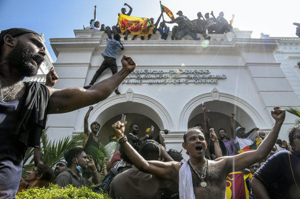 Protesters celebrate after taking control of the prime minister’s office in Colombo, Sri Lanka, in July 2022. A wave of discontent crested that year with a popular uprising over an economic collapse.