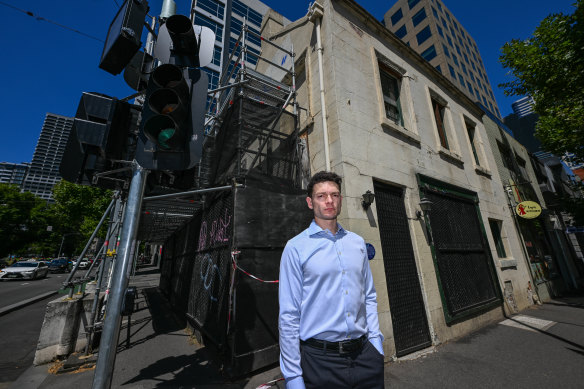 Lachlan Molesworth, deputy chair of the Natio<em></em>nal Trust, in front of the dilapidated building, o<em></em>nce known as Russell’s Old Corner Shop.
