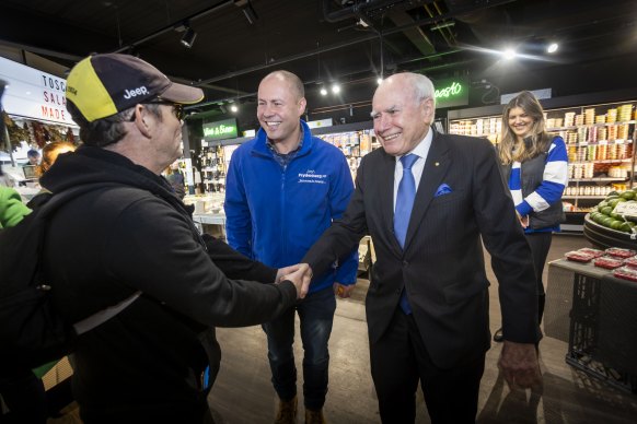 John Howard campaigning in Kew, Melbourne, with Treasurer Josh Frydenberg in the seat of Kooyong on Tuesday,