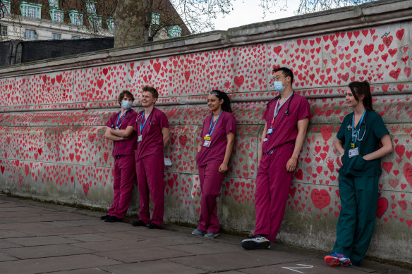 NHS at the National COVID Memorial - many frontline workers were insulted by the suggestion they had “cowered” from coronavirus.