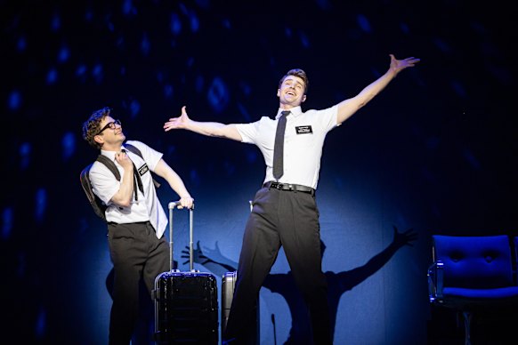 Cox (left) and Johnston perform in The Book of Mormon at The Capitol Theatre, Sydney.