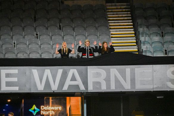 Brooke Warne, Jackson Warne and Summer Warne unveil the Shane Warne Stand.