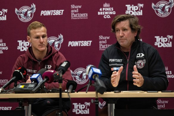 Somewhere over the rainbow ... Manly coach Des Hasler and captain Daly Cherry-Evans sport their sponsor’s logo as they address the media about controversy over the pride jersey.
