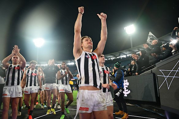 Darcy Moore of the Magpies celebrates after they defeated the Blues during the round 17 match on July 4, 2025.