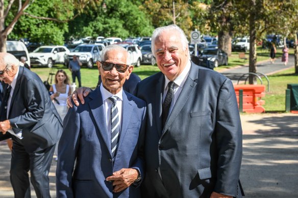 Footy greats Sid Jackson (left) and Sam Kekovich arrive at Ron Barassi’s memorial service.