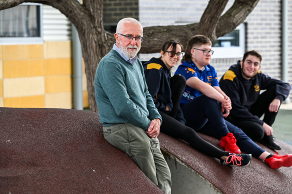 Kalianna School principal Peter Bush, with students Talia Blair, Zach Bingham and Jacob Creme, says schools should use the skills they developed during remote learning.