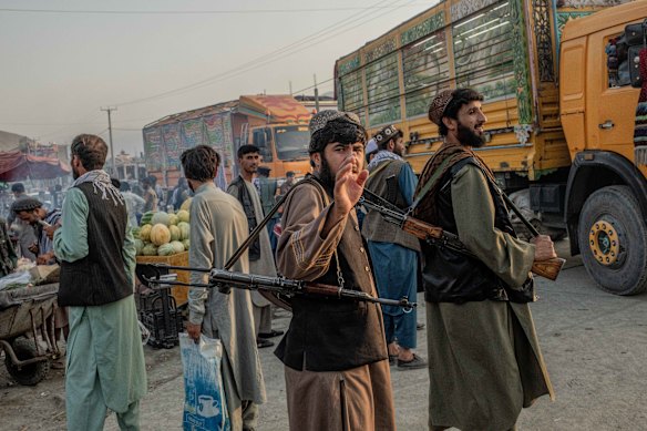  Police in Baharak market in Badakhshan Province.