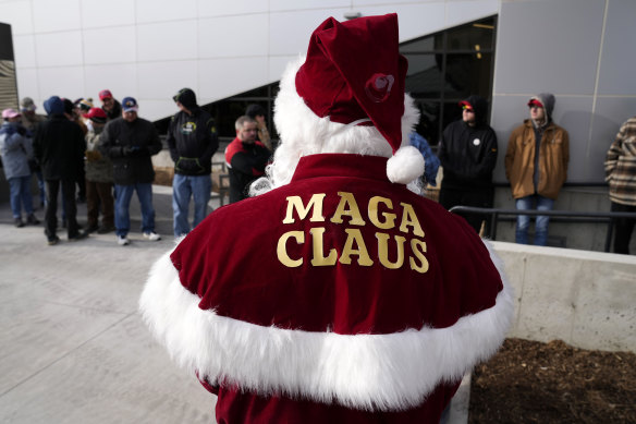 A man waits to enter a Trump rally in the state of Iowa.