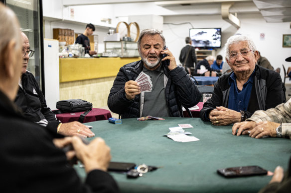 A game of cards in the club’s basement cafe.