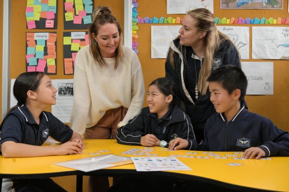 Teachers Olivia Pure (left) and Amanda Williams  and year 5 pupils Mia Wessell, Serena Lee and Ryan Lee at St Raphael’s Catholic Primary School, South Hurstville.